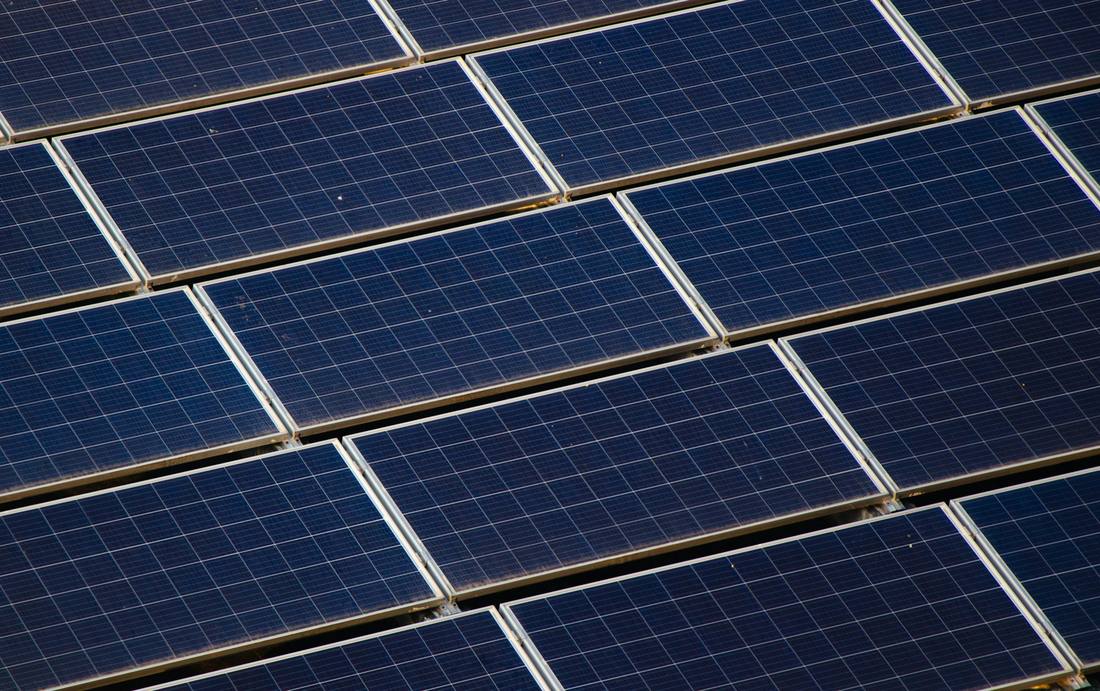 A large commercial rooftop solar array seen from above